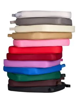Stack of chair cushions in multiple colors