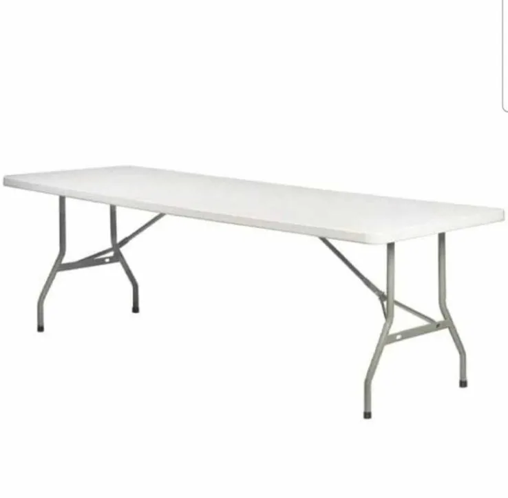Round and rectangular banquet tables set up for a South Florida party